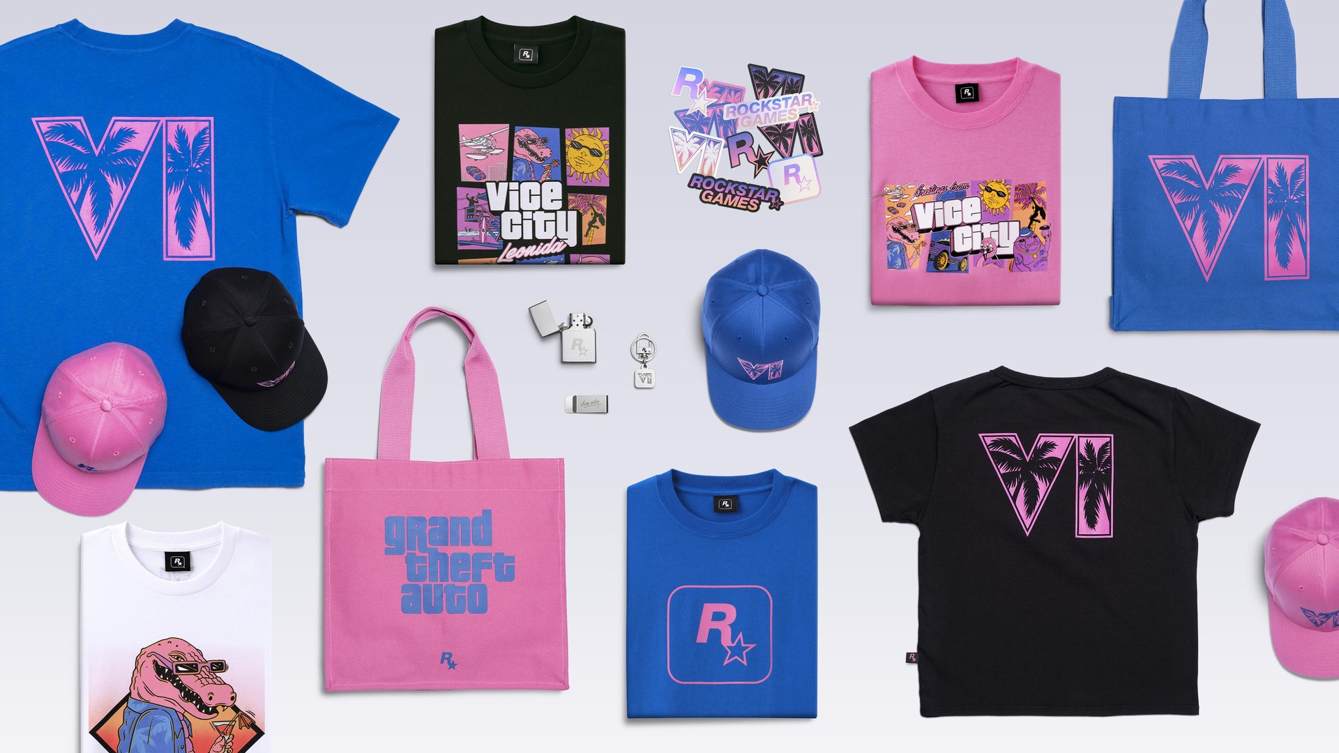 The GTA 6 Rockstar Store collection laid out in pink and blue: tees, caps, tote bags, stickers and chrome items