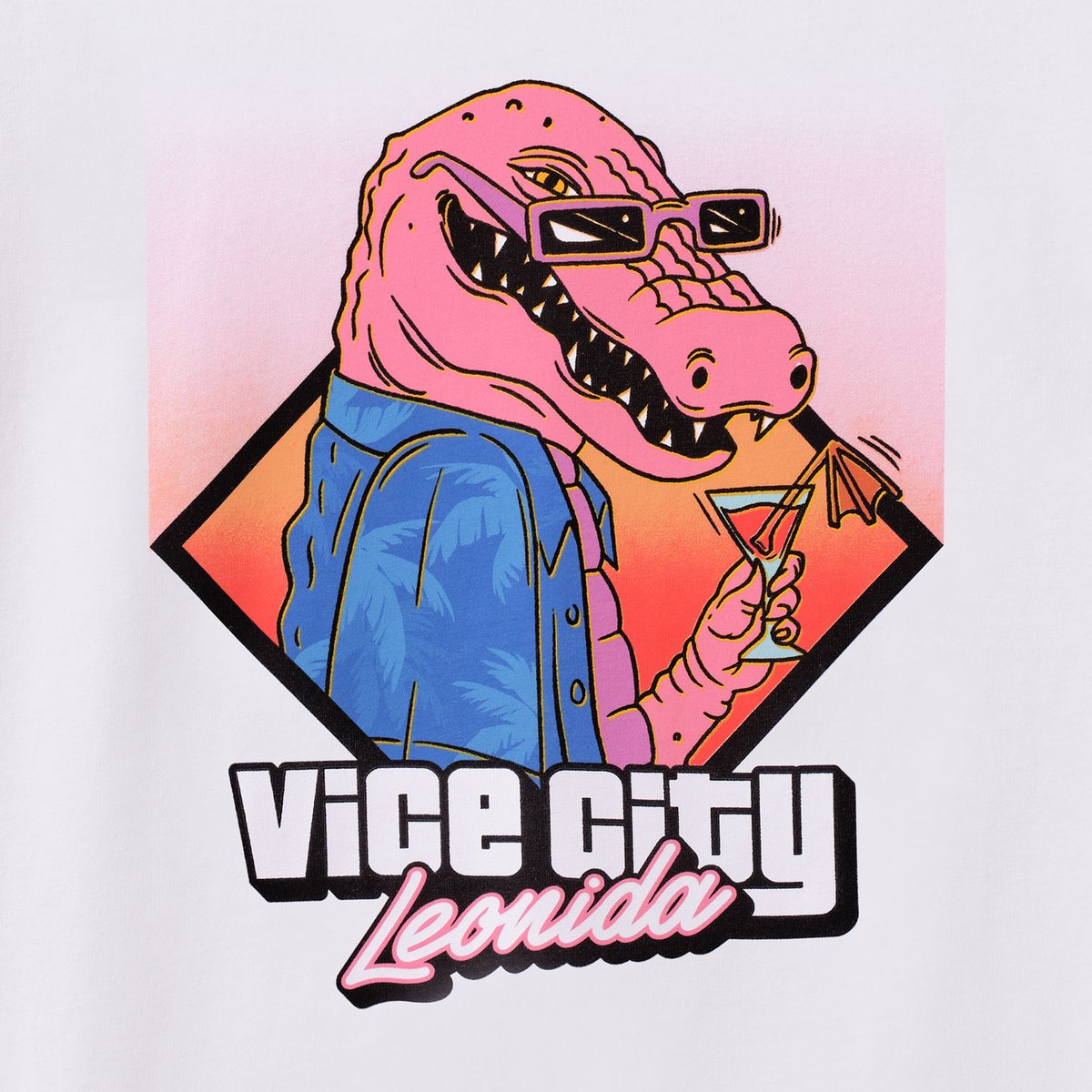 Print of the white GTA 6 Macca the Gator tee: the pink alligator in sunglasses holds a cocktail above the Vice City Leonida logo