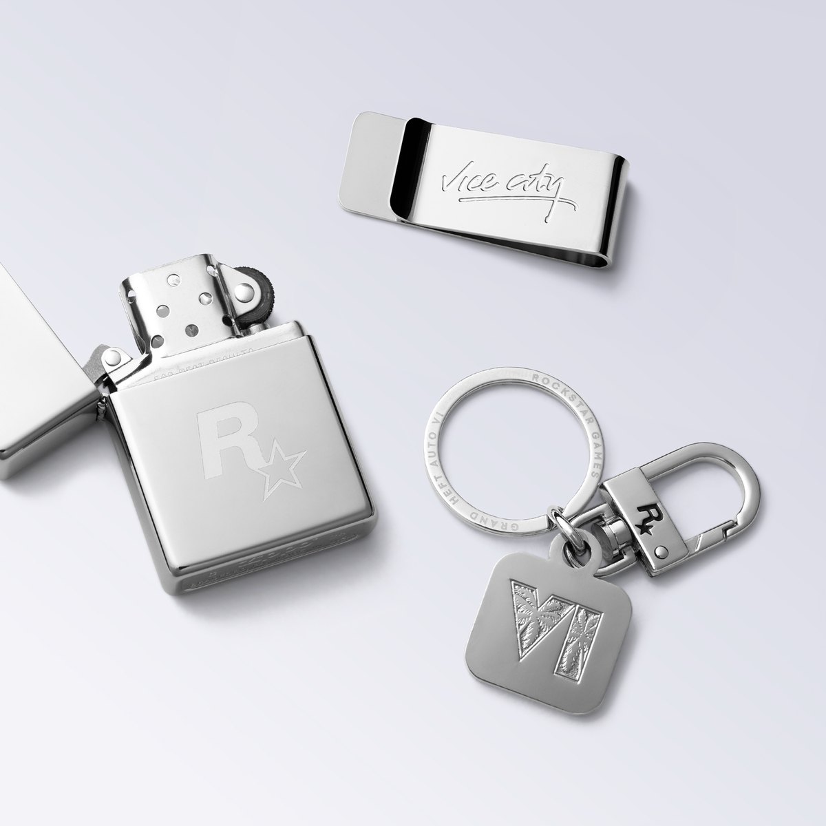 Zippo lighter with the Rockstar logo, Vice City money clip and VI logo keychain from the GTA 6 collection