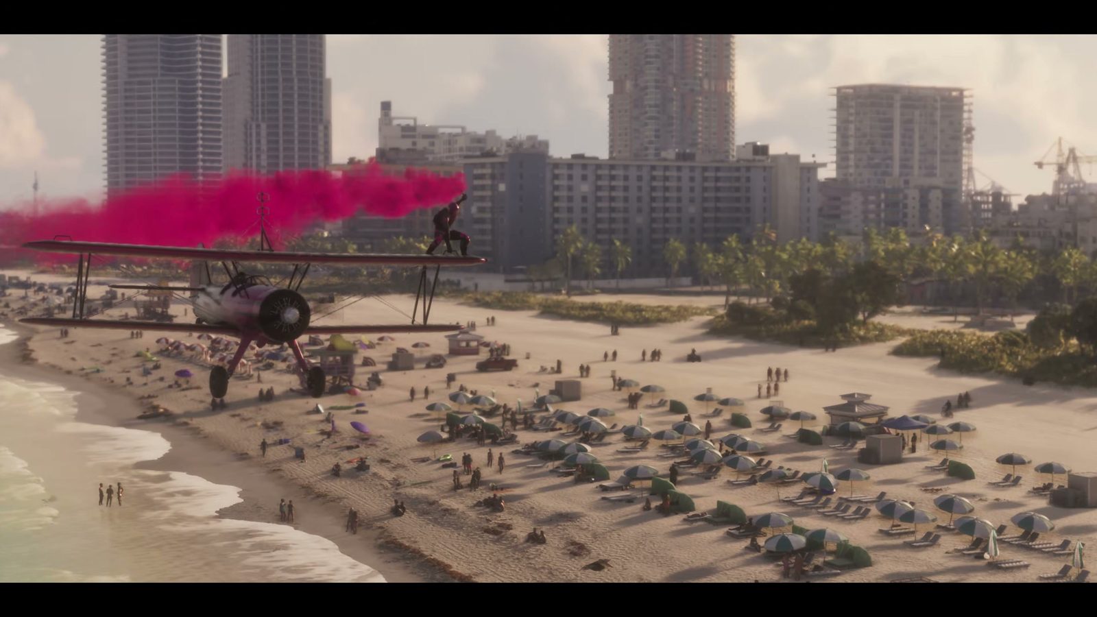A biplane trails pink smoke over a crowded Vice City beach, GTA 6 launch trailer