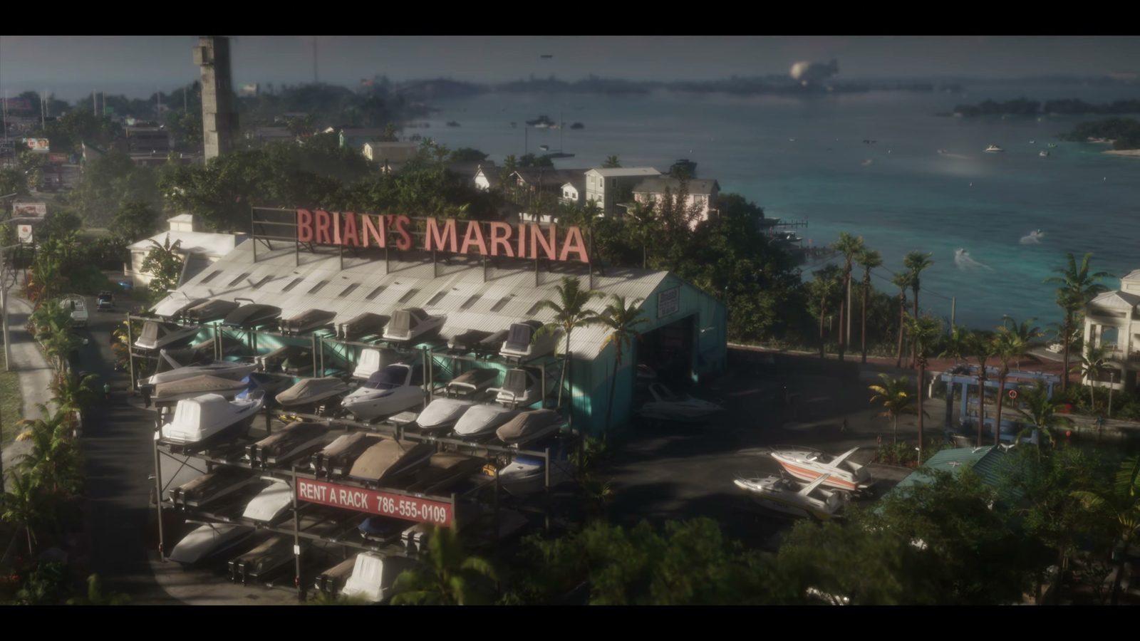 Aerial view of Brian's Marina in the Keys, with boats stored on racks and turquoise water, GTA 6 launch trailer