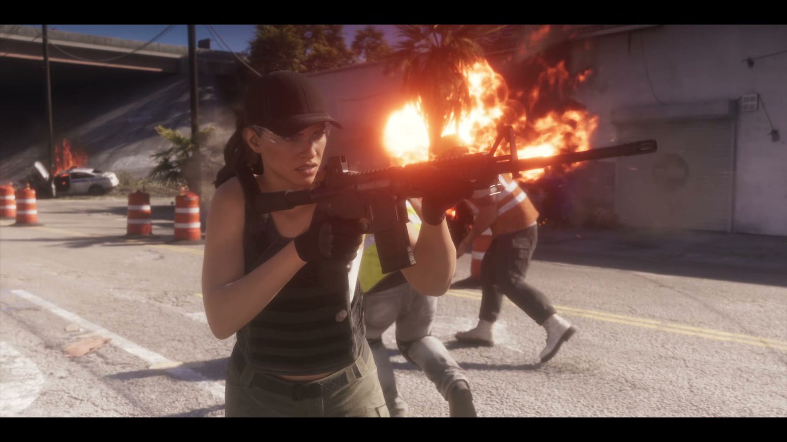 A woman in a cap fires a rifle in a street under construction, GTA 6 launch trailer