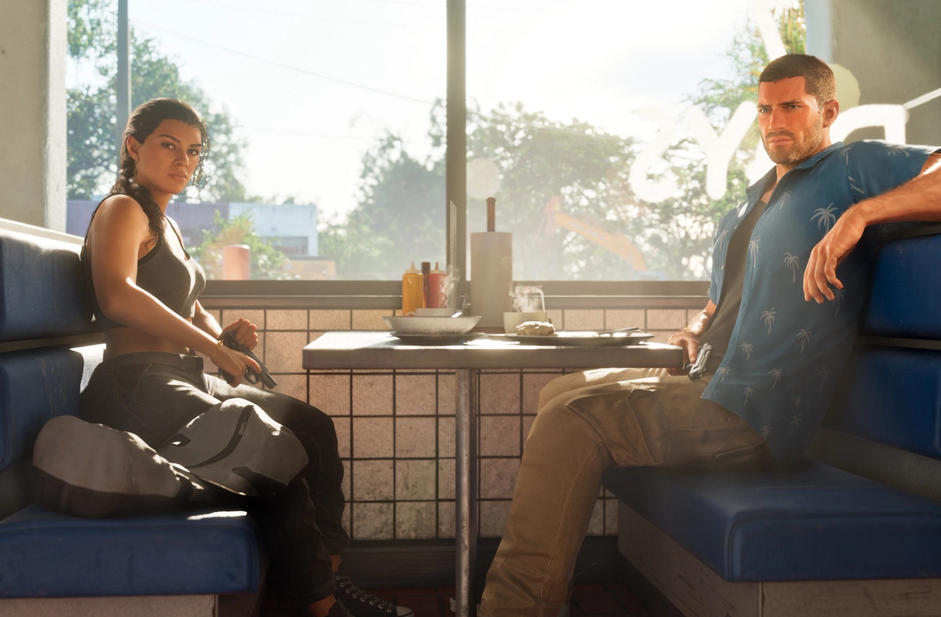 Lucia and Jason sitting across from each other in a sunlit GTA 6 diner, a new image published by LOVE Magazine