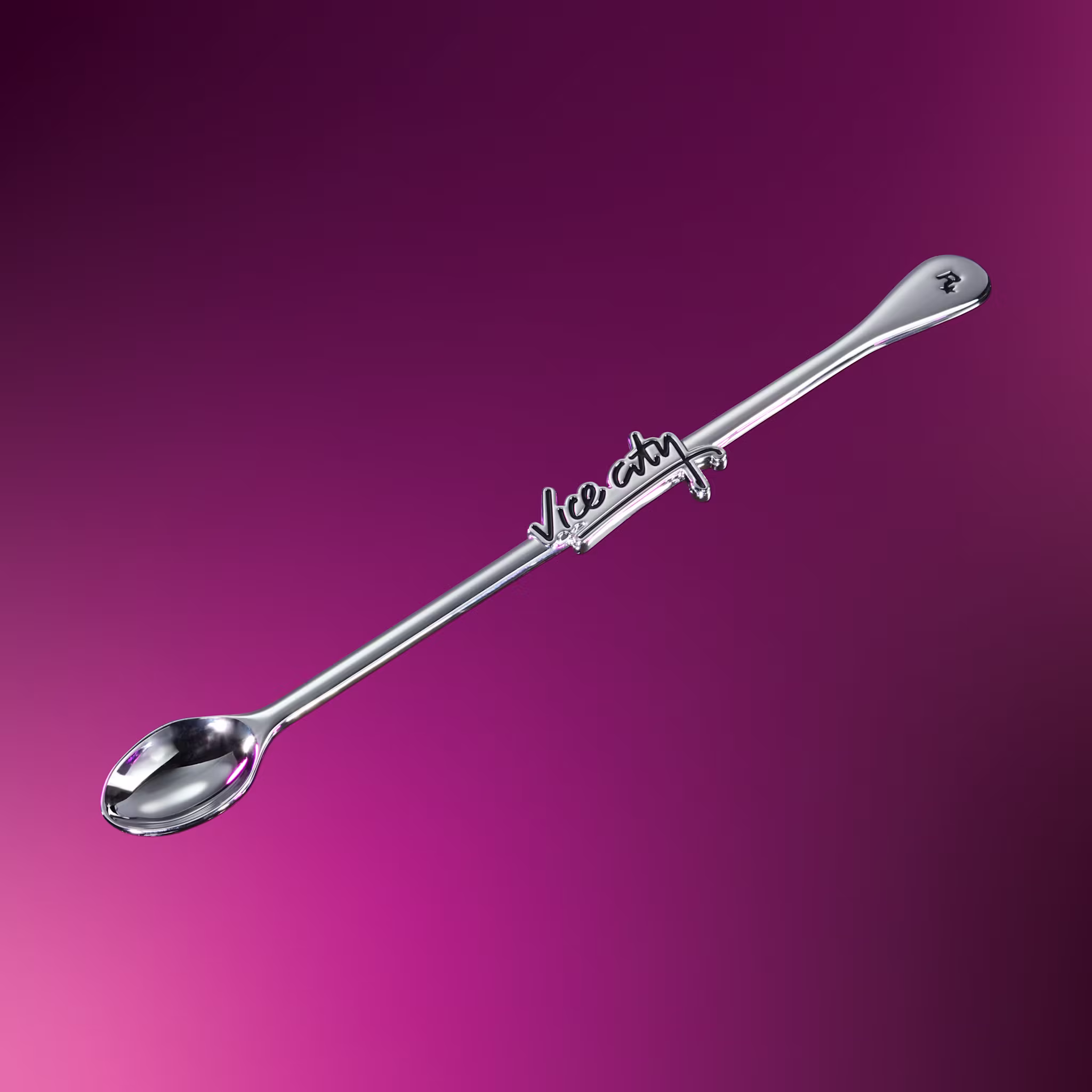 Silver swizzle spoon with the Vice City logo