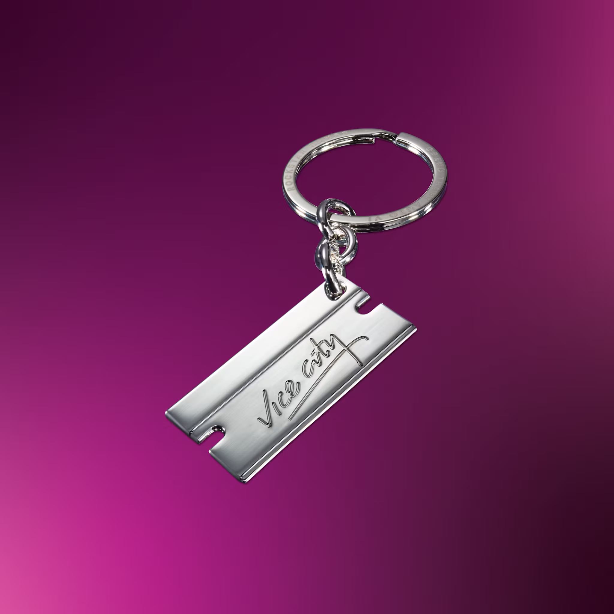 Silver razor blade keychain engraved with Vice City