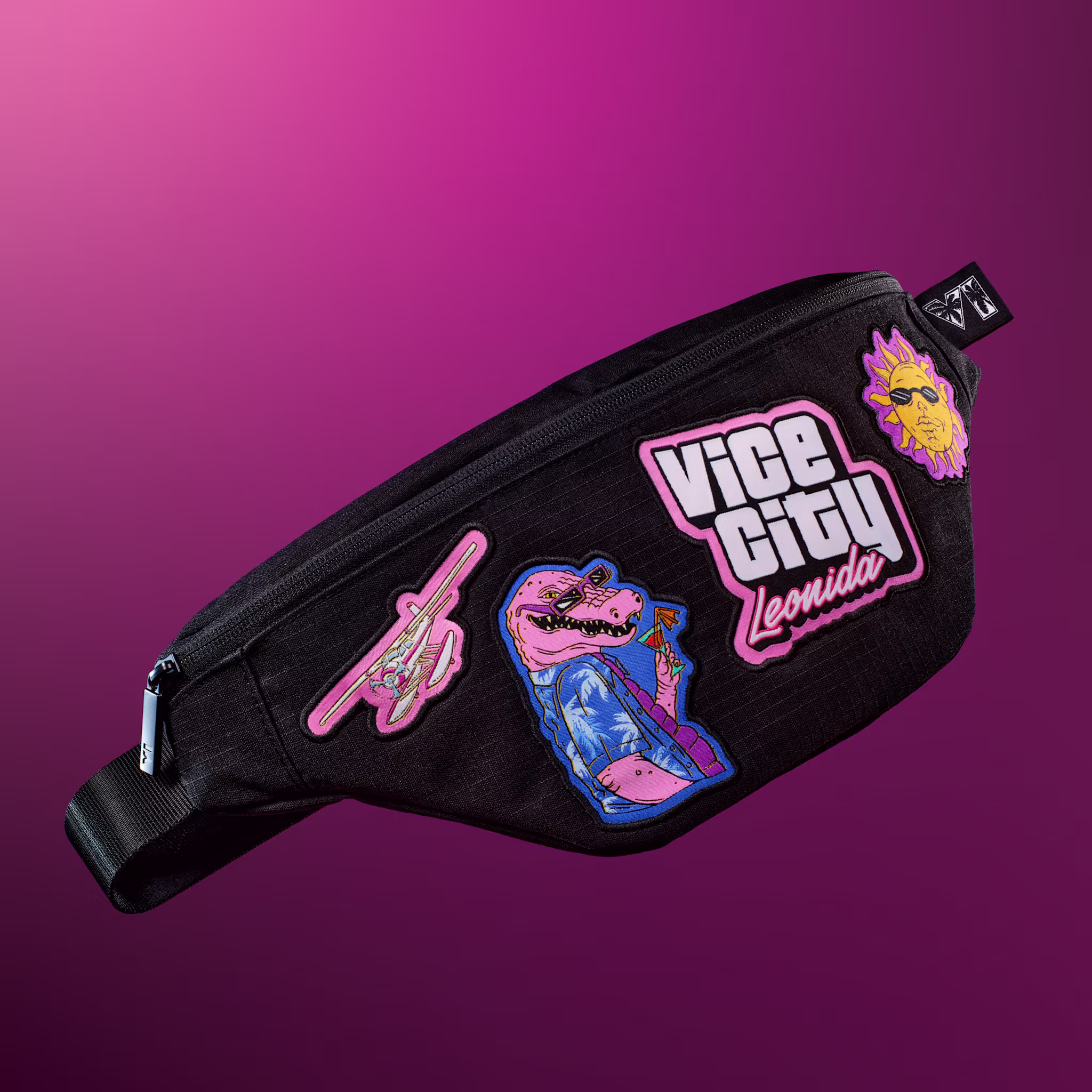 Black Leonida Keys crossbody bag with Vice City and Macca the Gator patches