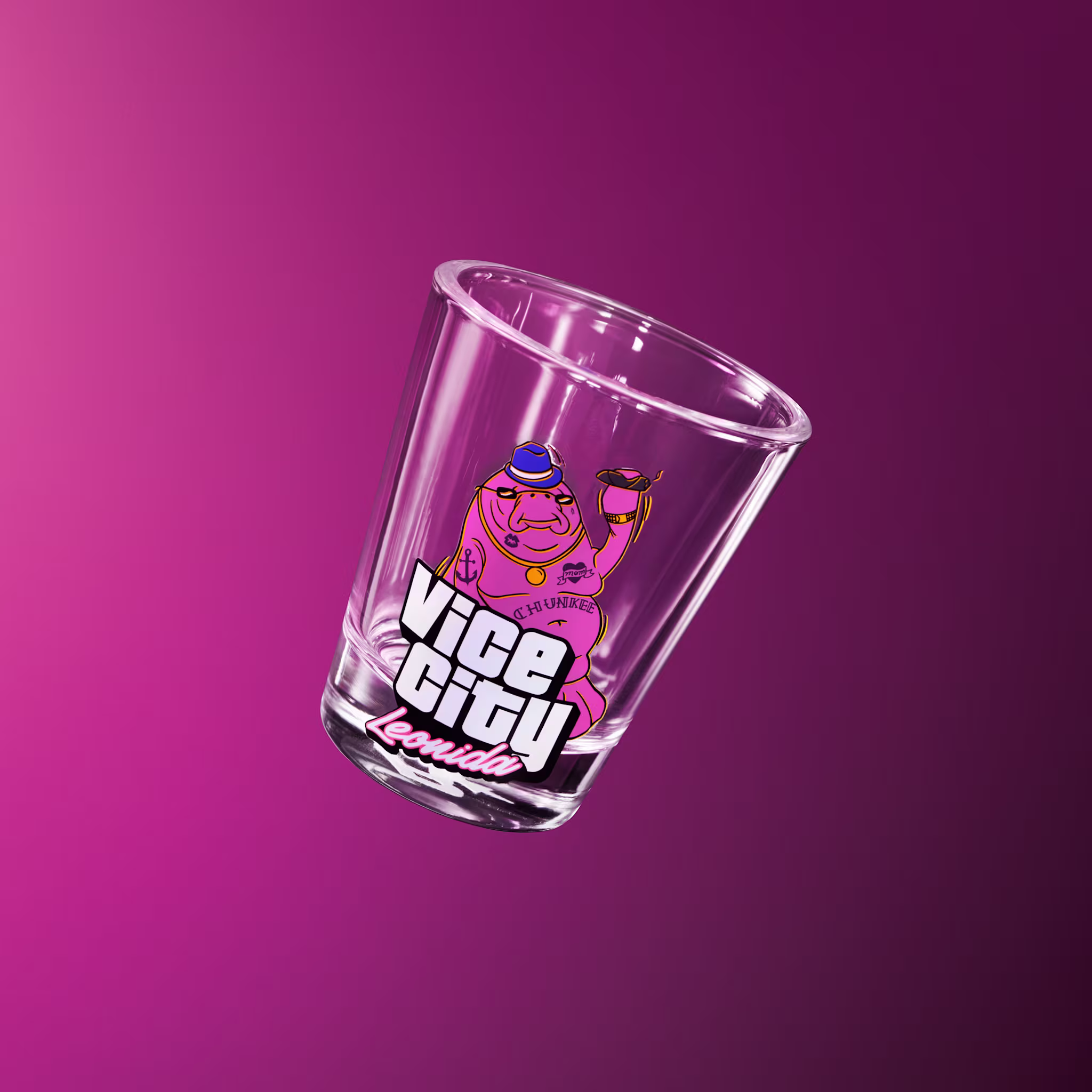 Clear shot glass featuring Chunkee the Manatee and the Vice City Leonida logo