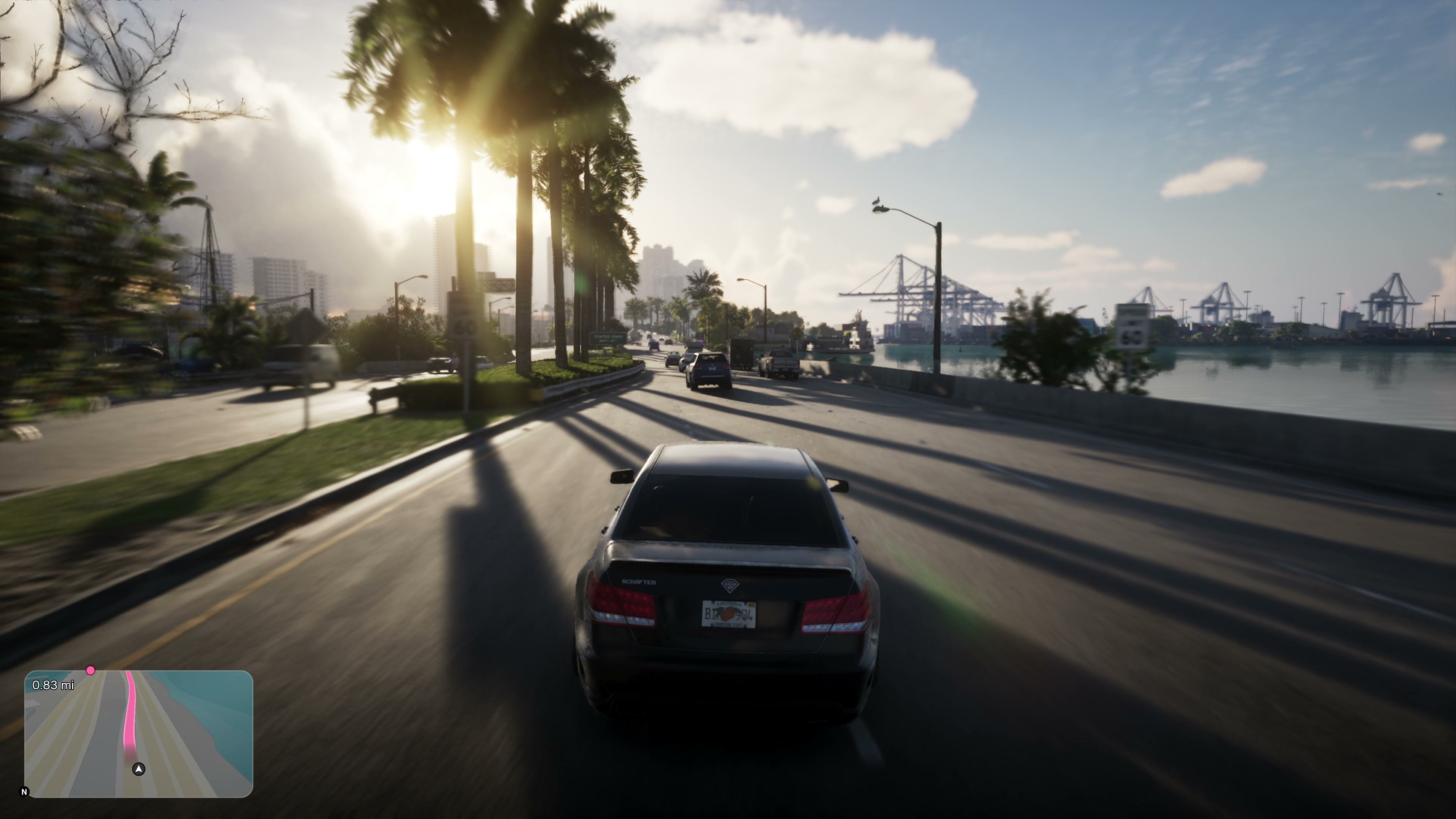 Driving down a palm-lined road in GTA 6, with the minimap